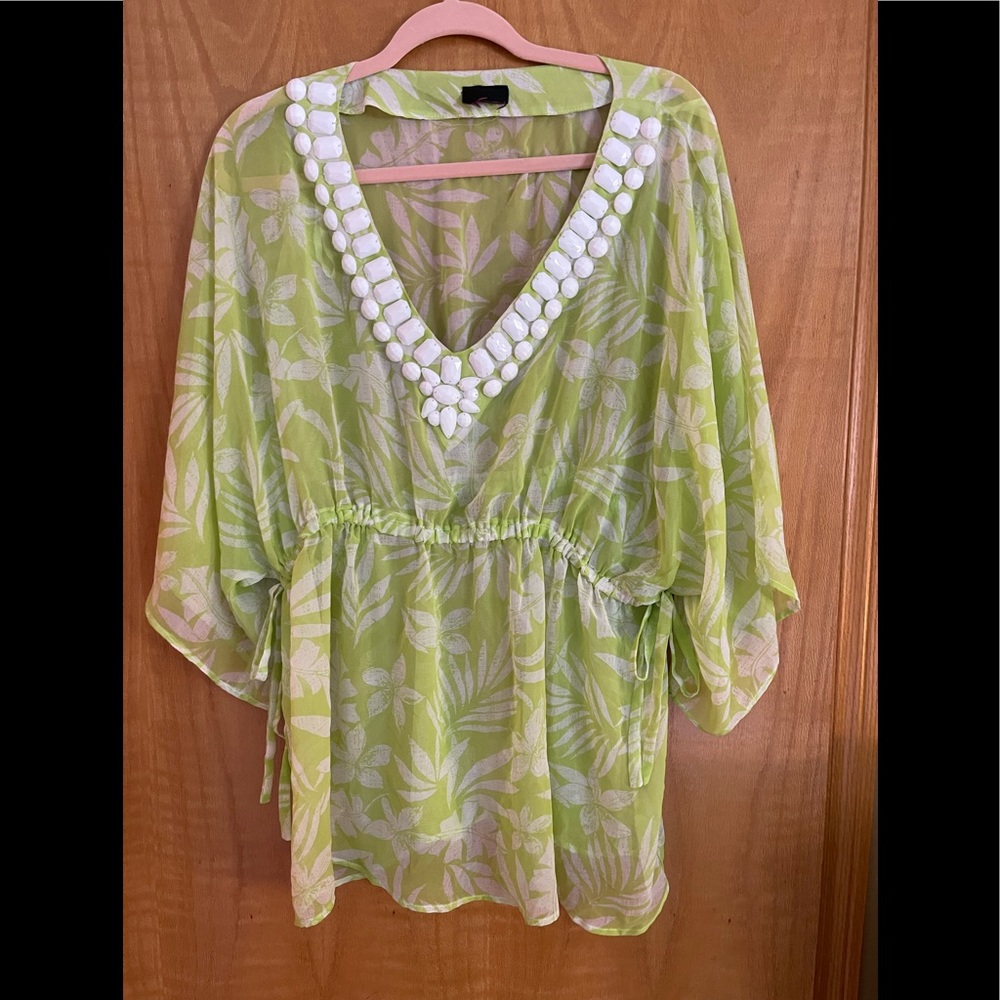 Beautiful bright green sheer blouse with white embellished neckline.